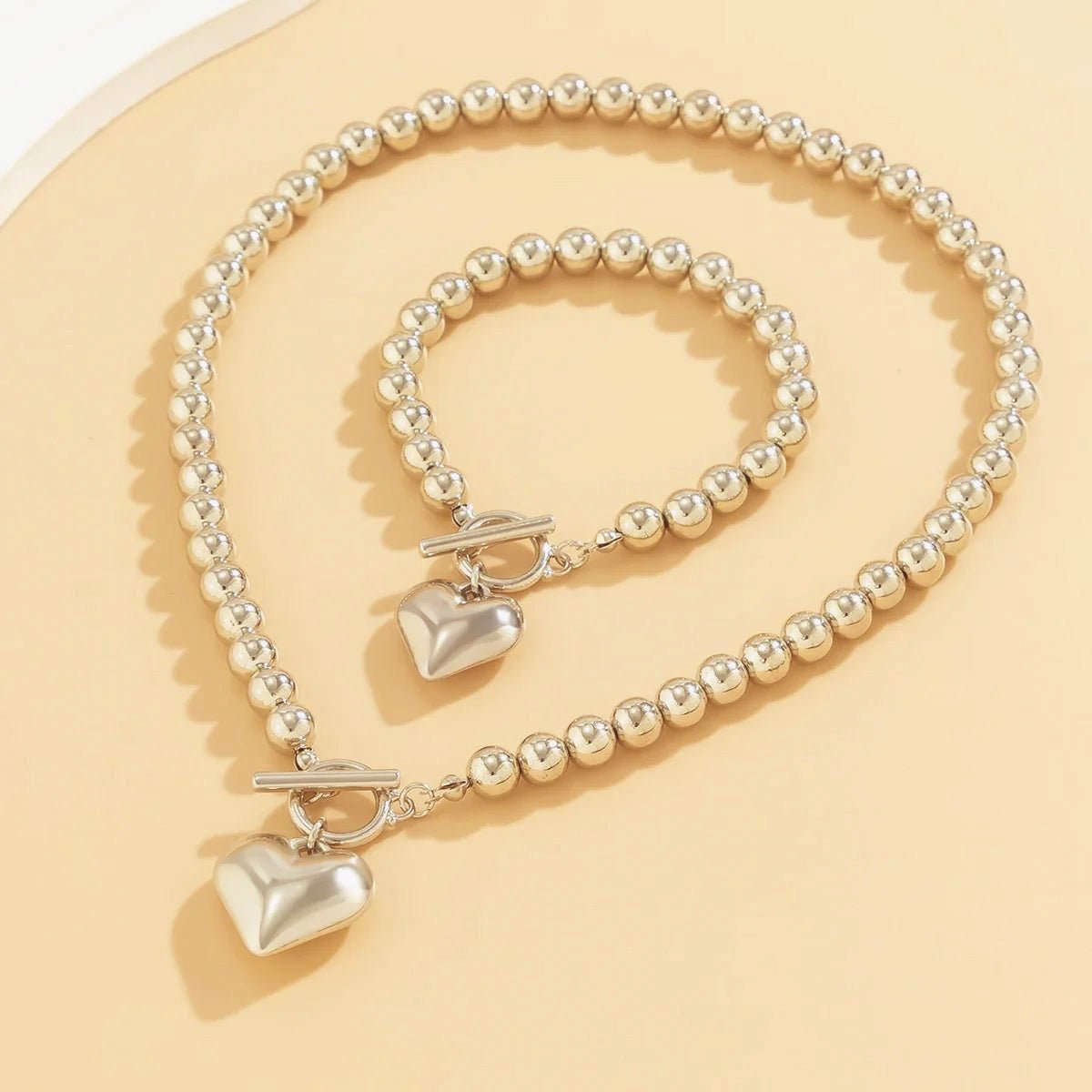 Set van armband en ketting met hartvormige hanger van 2 stuks