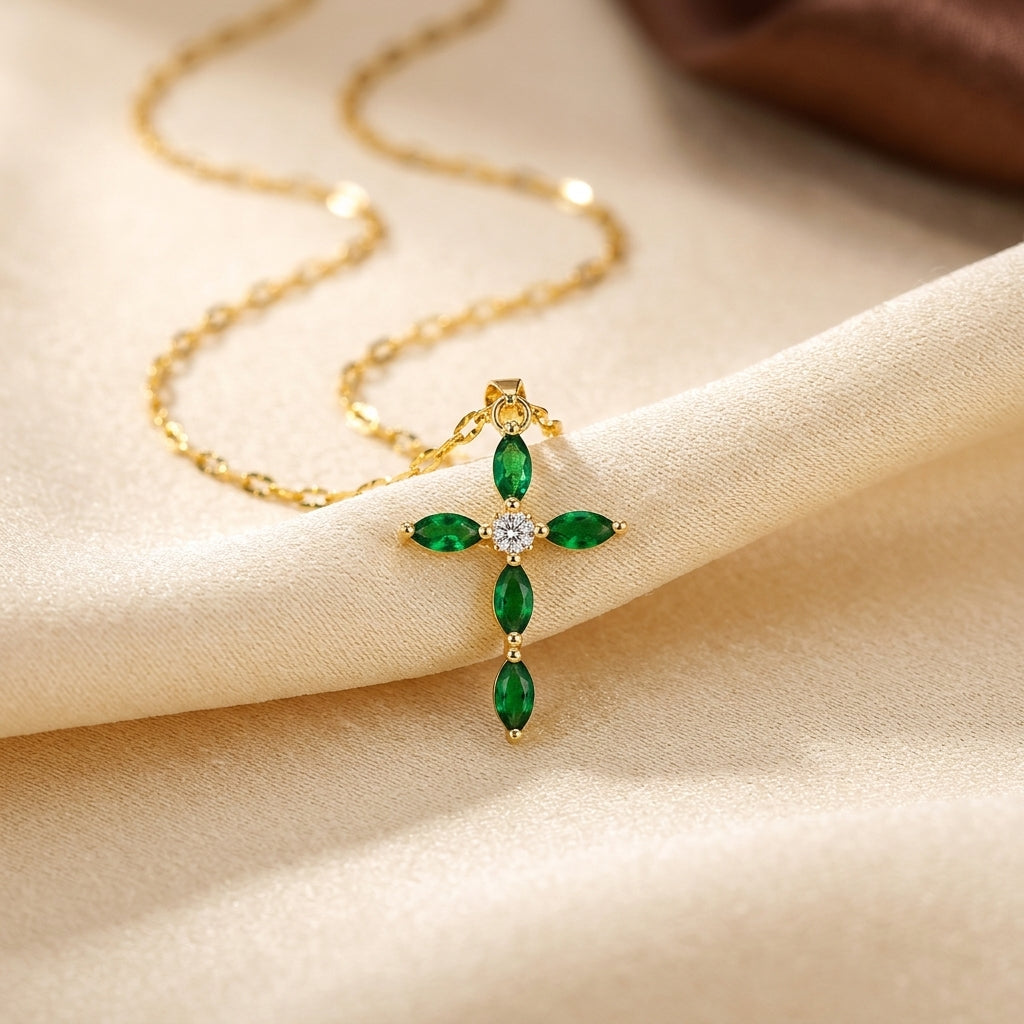 Kruis collier met marquise smaragd in goud
