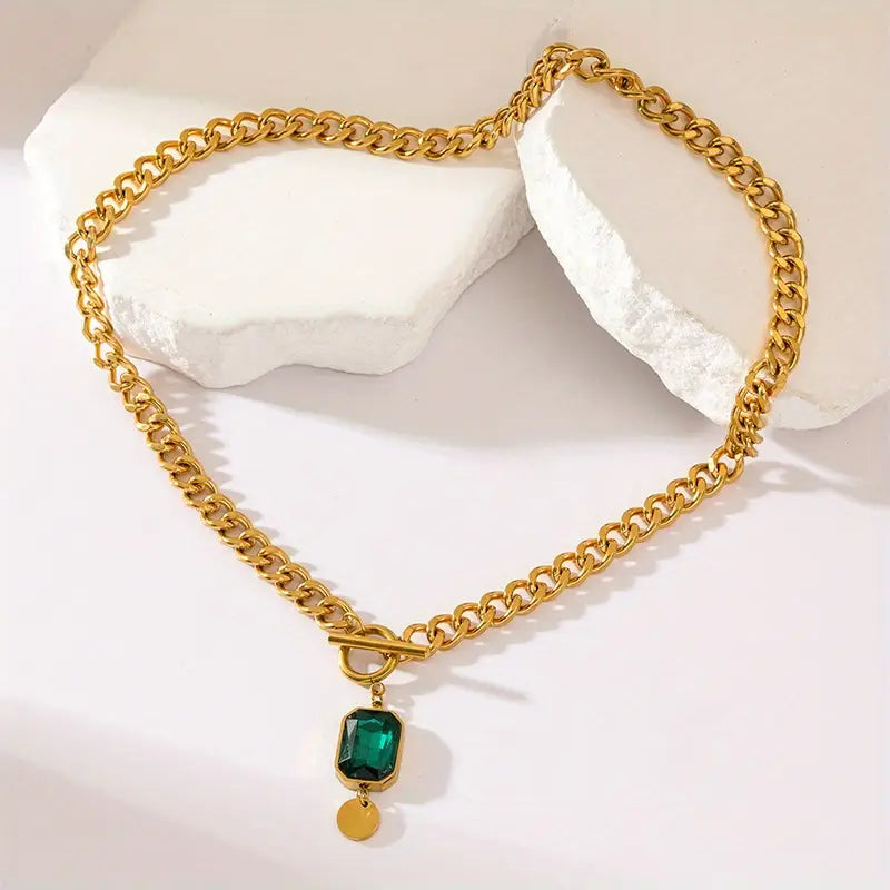 Gouden ketting met smaragd