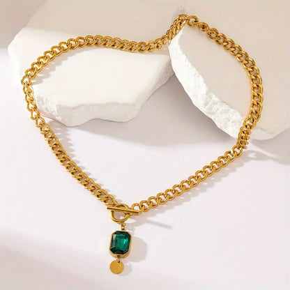 Gouden ketting met smaragd
