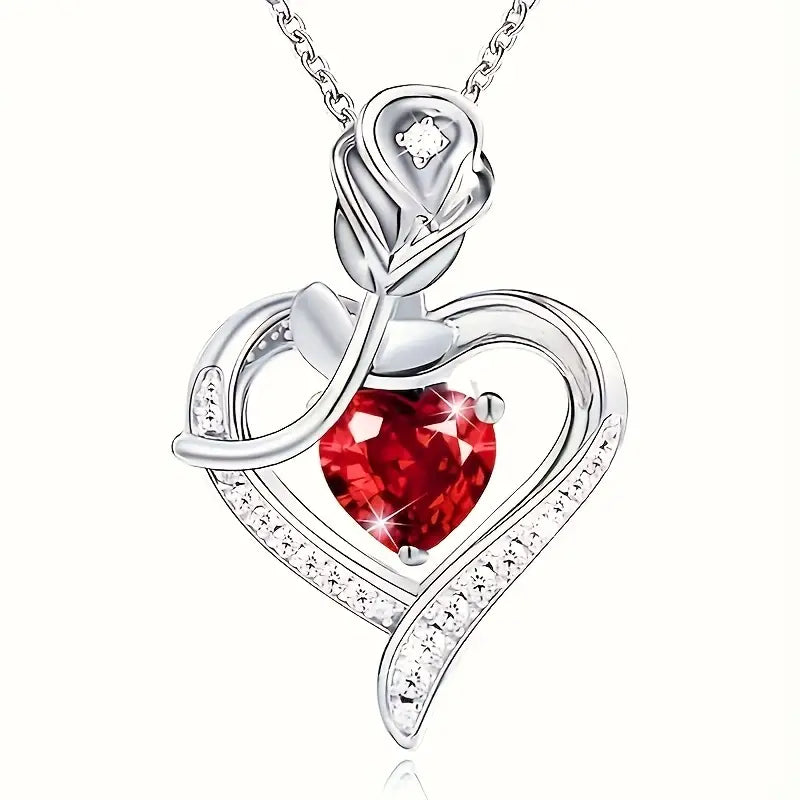 Collier met een hartvormige robijnhanger in zilver
