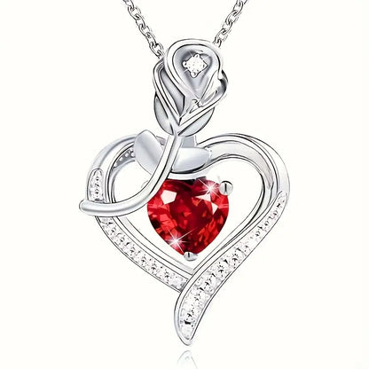 Collier met een hartvormige robijnhanger in zilver