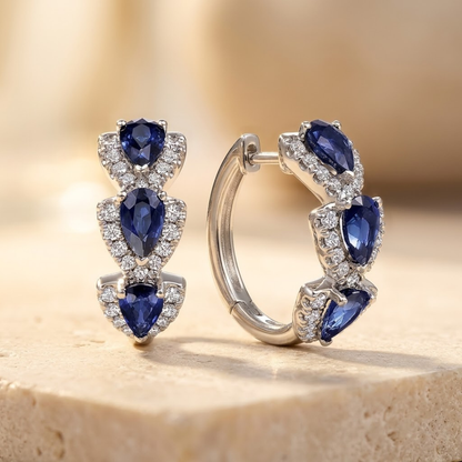 Halo sierraad met saffier in zilver