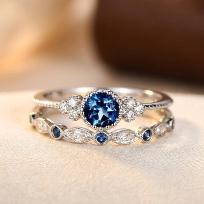 Halo ring met saffier in zilver
