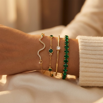 Groene edelstenen armbandenset van goud