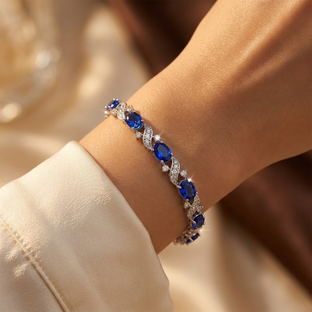 Saffier bloemenlink armband in zilver