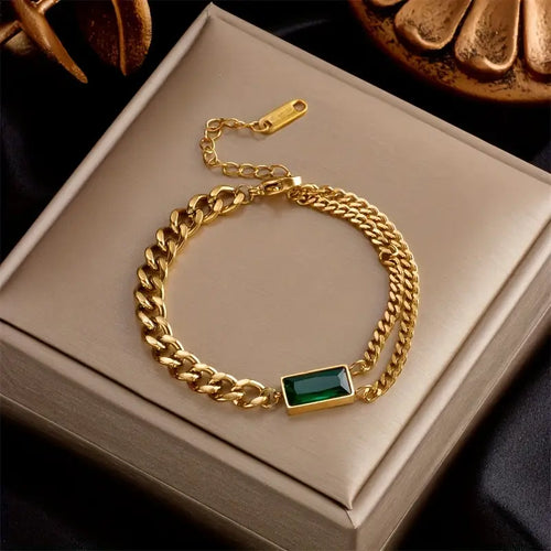 Gouden armband met smaragd barrette