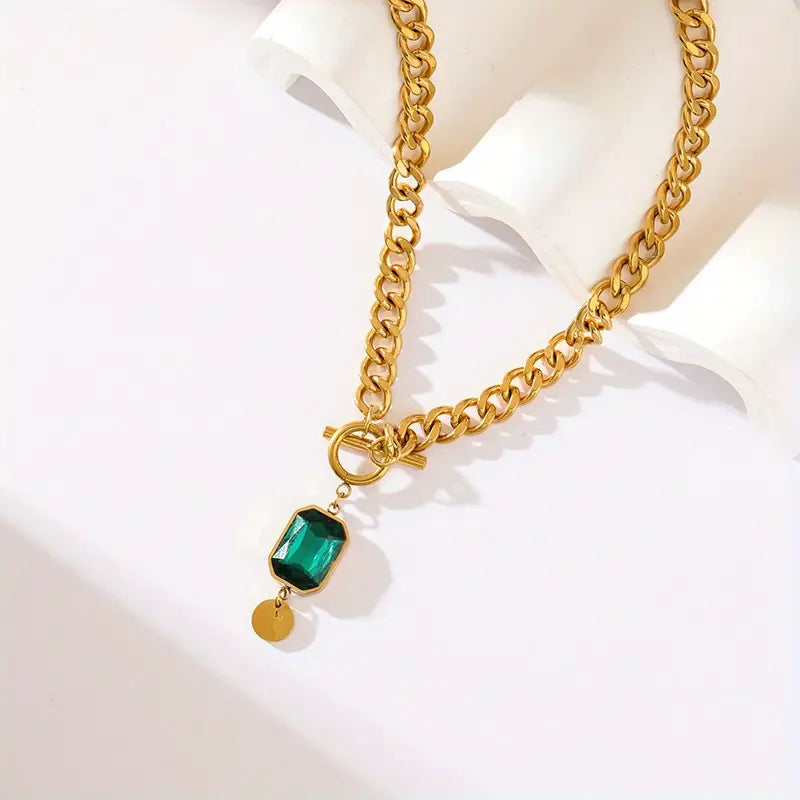Gouden ketting met smaragd