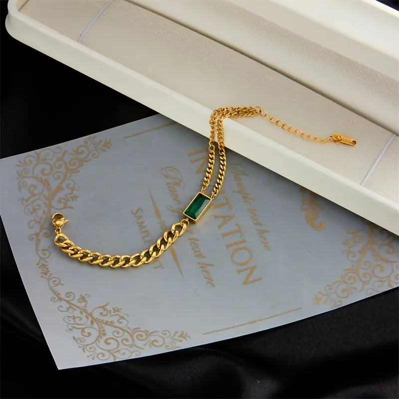 Gouden armband met smaragd barrette