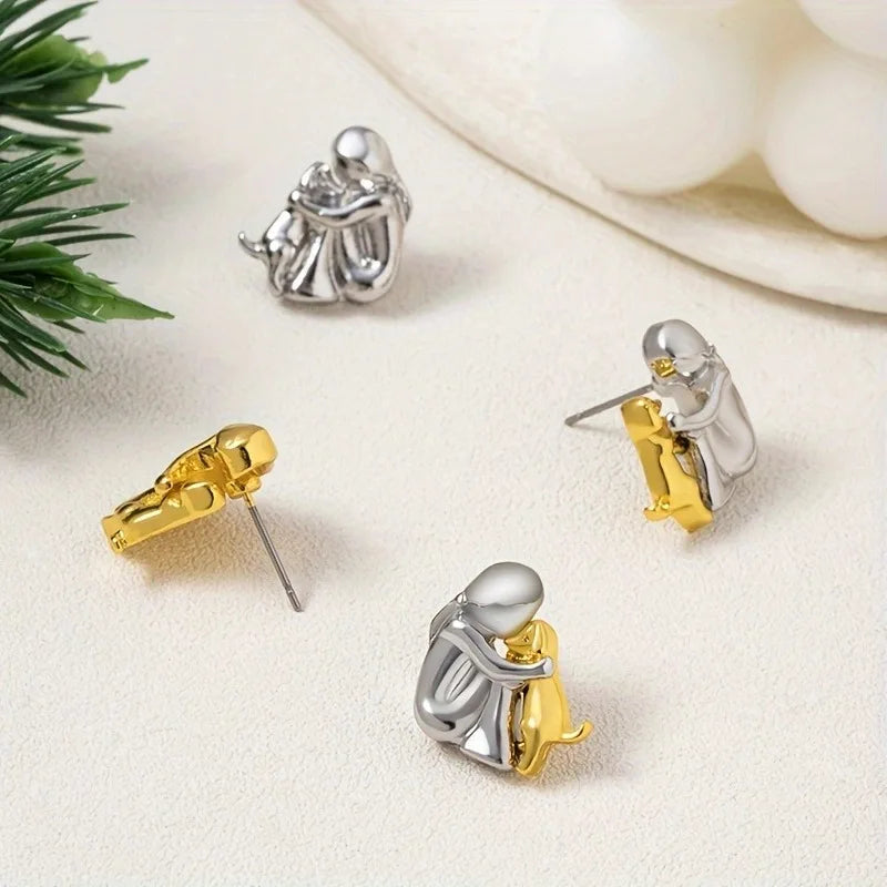 Hug Oorbellen in Zilver en Goud