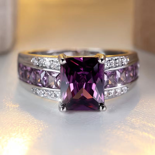 Amethist ring met kanaalzetting in zilver