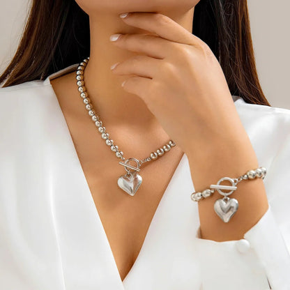 Set van armband en ketting met hartvormige hanger van 2 stuks