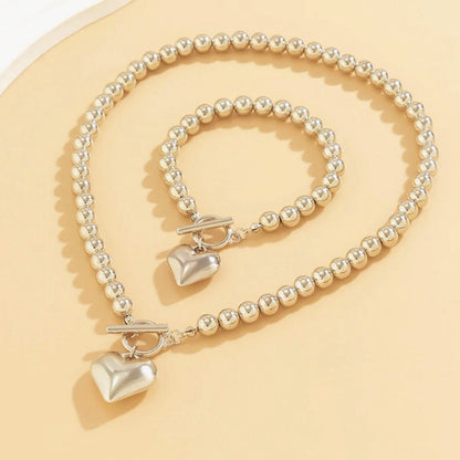 Set van armband en ketting met hartvormige hanger van 2 stuks