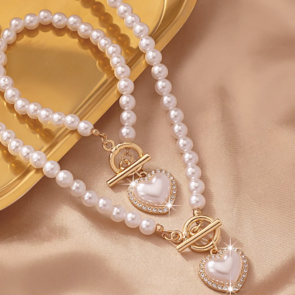 Set van armband en ketting met hartvormige hanger van 2 stuks