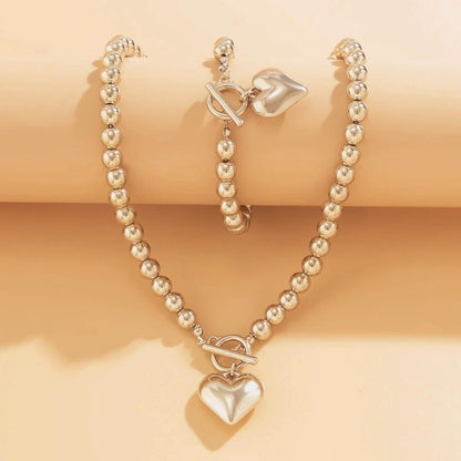 Set van armband en ketting met hartvormige hanger van 2 stuks