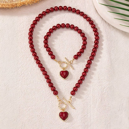 Set van armband en ketting met hartvormige hanger van 2 stuks