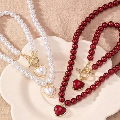 Set van armband en ketting met hartvormige hanger van 2 stuks