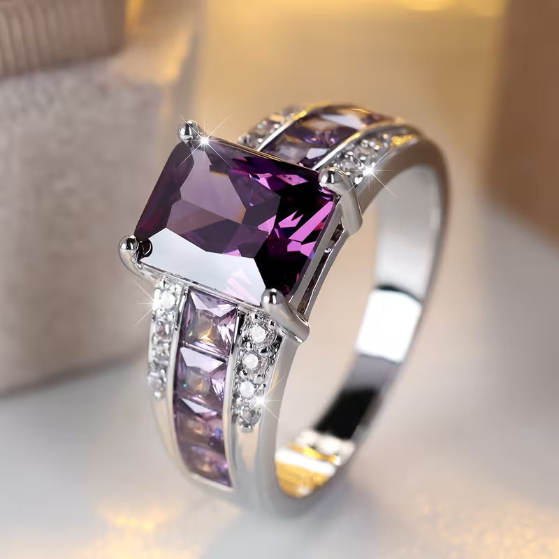 Amethist ring met kanaalzetting in zilver