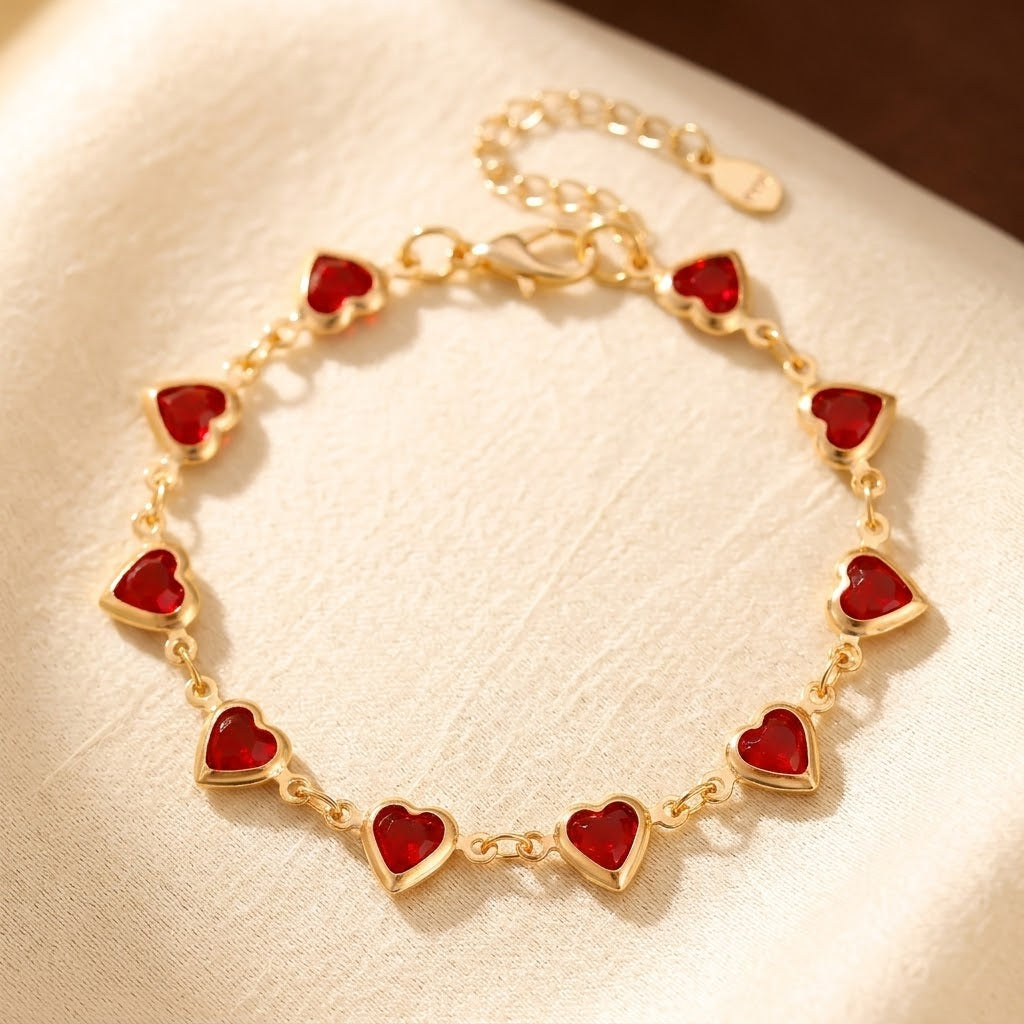 Gouden armband met hartvormige robijn