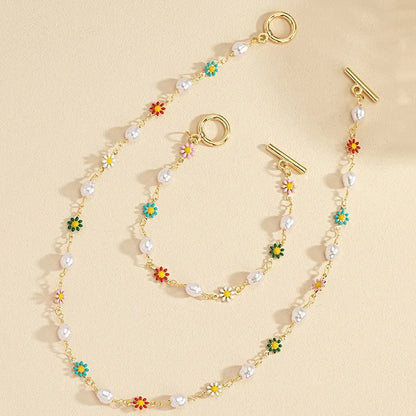 Set van Delicate Lente Bloemparelarmband en Ketting