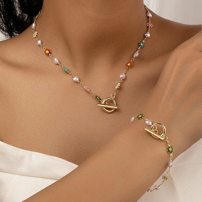 Set van Delicate Lente Bloemparelarmband en Ketting