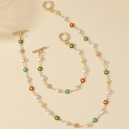 Set van Delicate Lente Bloemparelarmband en Ketting