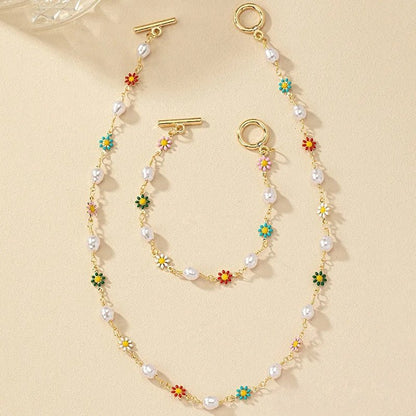Set van Delicate Lente Bloemparelarmband en Ketting