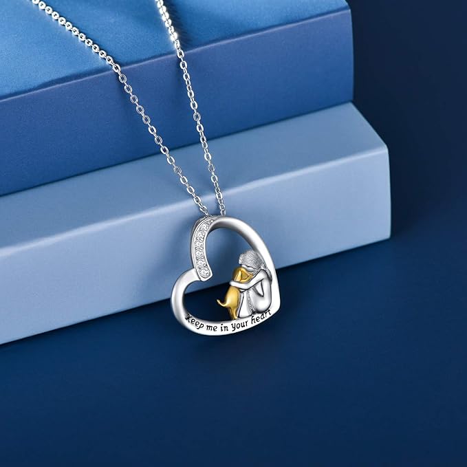 Zilveren hartketting met hond en zirkoniasteentjes