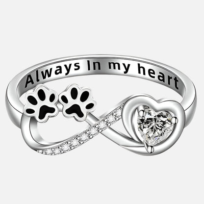 Ring met pootafdruk, hart en oneindigheidsteken